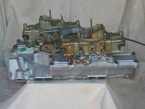 The cross-ram intake manifold was developed for the 302 engine using knowle...