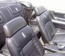 Seats with headrests